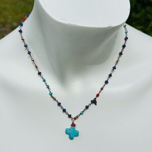 DolceDeLeti-Signed Boho Turquoise cross with lapis coral and turquoise beads.
